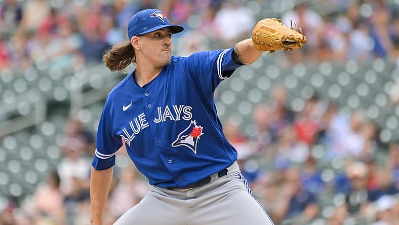 Aug 7, 2022; Minneapolis, Minnesota, USA; Toronto Blue Jays starting pitcher Kevin Gausman (34) throws a pitch against the Minnesota Twins during the first inning at Target Field. Mandatory Credit: Jeffrey Becker-USA TODAY Sports