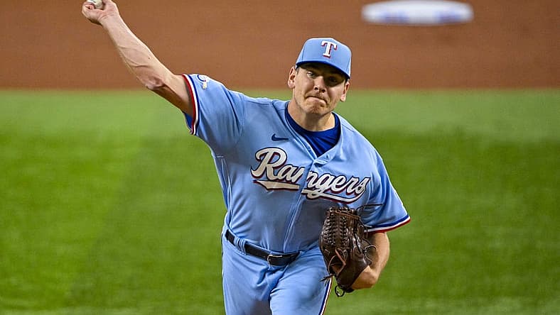 Aug 7, 2022; Arlington, Texas, USA; Texas Rangers starting pitcher Spencer Howard (31) pitches against the Chicago White Sox during the first inning at Globe Life Field. Mandatory Credit: Jerome Miron-USA TODAY Sports