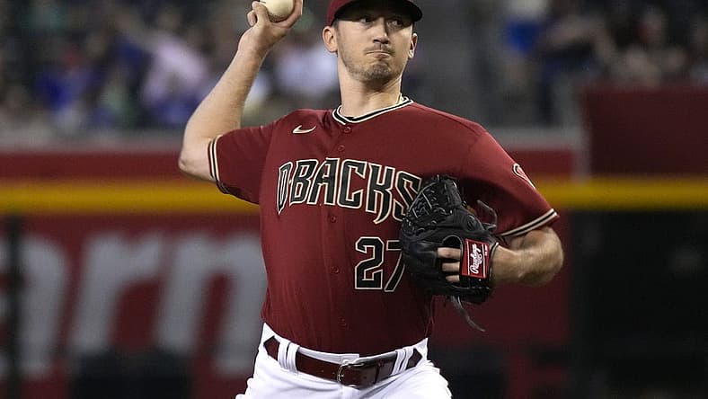 Aug 7, 2022; Phoenix, Arizona, USA; Arizona Diamondbacks starting pitcher Zach Davies (27) thows against the Colorado Rockies in the first inning at Chase Field. Mandatory Credit: Rick Scuteri-USA TODAY Sports
