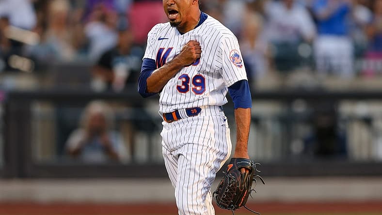 Aug 7, 2022; New York City, New York, USA; New York Mets relief pitcher Edwin Diaz (39) reacts after closing the game against the Atlanta Braves at Citi Field. Mandatory Credit: Vincent Carchietta-USA TODAY Sports