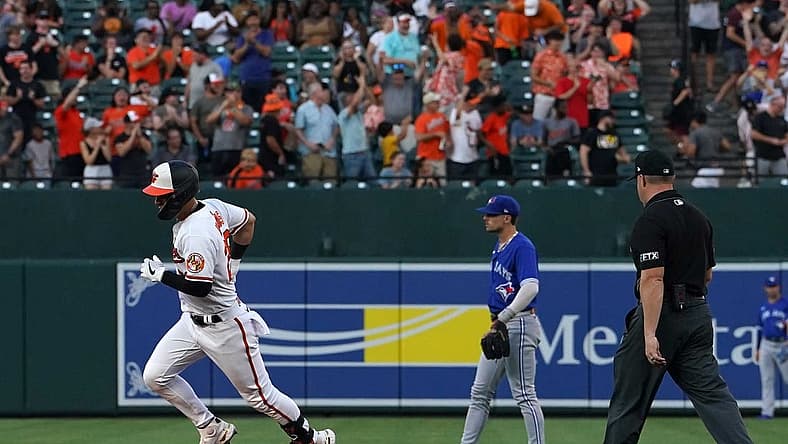 Aug 8, 2022; Baltimore, Maryland, USA; Baltimore Orioles second baseman Ramon Urias (29) rounds the bases after his three run home run in the first inning against the Toronto Blue Jays at Oriole Park at Camden Yards. Mandatory Credit: Mitch Stringer-USA TODAY Sports
