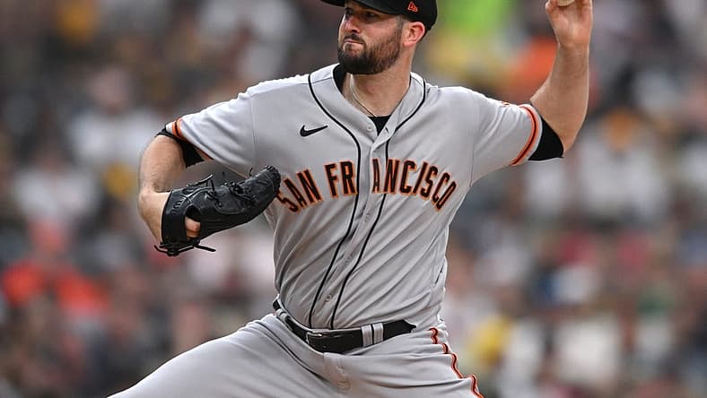 Aug 8, 2022; San Diego, California, USA; San Francisco Giants starting pitcher Alex Wood (57) throws a pitch against the San Diego Padres during the first inning at Petco Park. Mandatory Credit: Orlando Ramirez-USA TODAY Sports