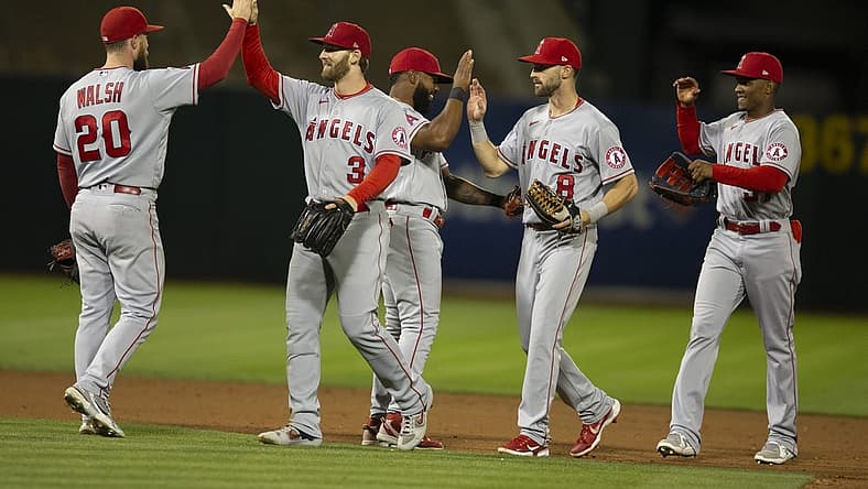 Aug 8, 2022; Oakland, California, USA; Los Angeles Angels players celebrate their 1-0 victory over the Oakland Athletics at RingCentral Coliseum. Mandatory Credit: D. Ross Cameron-USA TODAY Sports