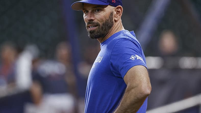 Aug 9, 2022; Houston, Texas, USA; Texas Rangers manager Chris Woodward (8) stands on the field before the game against the Houston Astros at Minute Maid Park. Mandatory Credit: Troy Taormina-USA TODAY Sports