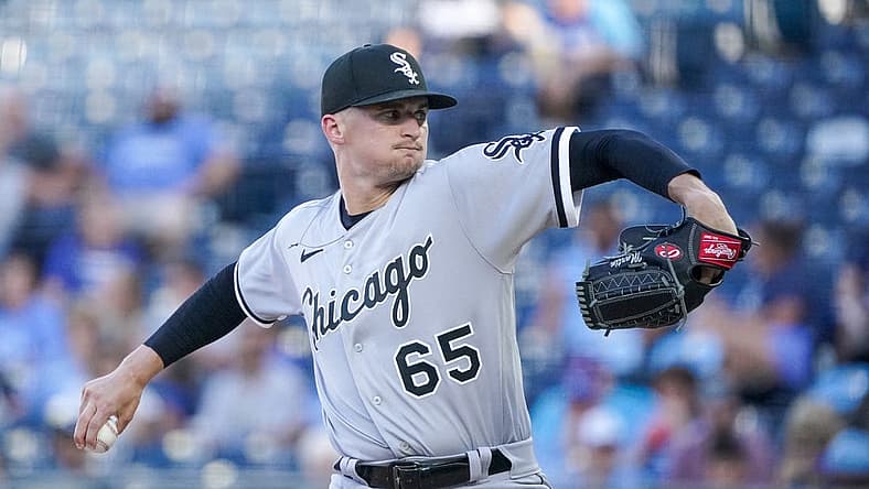 Aug 9, 2022; Kansas City, Missouri, USA; Chicago White Sox starting pitcher Davis Martin (65) delivers a pitch against the Kansas City Royals in the first inning at Kauffman Stadium. Mandatory Credit: Denny Medley-USA TODAY Sports