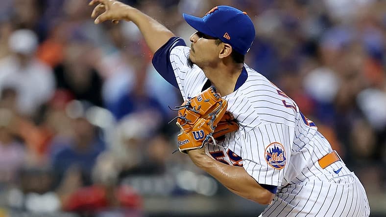 Aug 9, 2022; New York City, New York, USA; New York Mets starting pitcher Carlos Carrasco (59) pitches against the Cincinnati Reds during the first inning at Citi Field. Mandatory Credit: Brad Penner-USA TODAY Sports