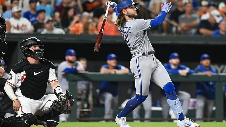 Aug 9, 2022; Baltimore, Maryland, USA; Toronto Blue Jays shortstop Bo Bichette (11) swings through a three run home run in the sixth inning against the Baltimore Orioles at Oriole Park at Camden Yards. Mandatory Credit: Tommy Gilligan-USA TODAY Sports