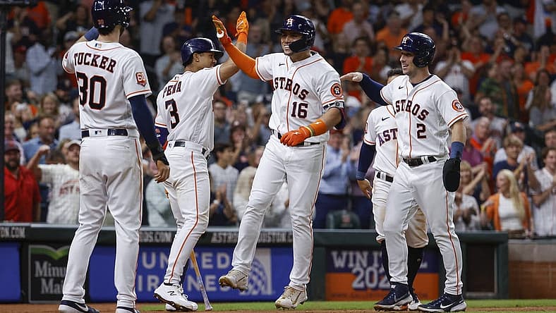Aug 9, 2022; Houston, Texas, USA; Houston Astros left fielder Aledmys Diaz (16) celebrates with teammates after hitting a grad slam during the fourth inning against the Texas Rangers at Minute Maid Park. Mandatory Credit: Troy Taormina-USA TODAY Sports
