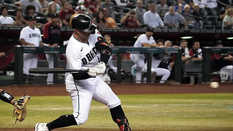 Aug 9, 2022; Phoenix, Arizona, USA; Arizona Diamondbacks first baseman Christian Walker (53) hits an RBI single against the Pittsburgh Pirates during the first inning at Chase Field. Mandatory Credit: Joe Camporeale-USA TODAY Sports