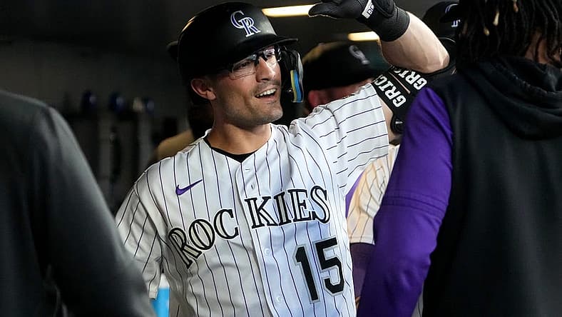 Aug 9, 2022; Denver, Colorado, USA; Colorado Rockies right fielder Randal Grichuk (15) celebrates his three run home run the third inning against the St. Louis Cardinals at Coors Field. Mandatory Credit: Ron Chenoy-USA TODAY Sports