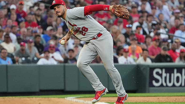 Aug 9, 2022; Denver, Colorado, USA; St. Louis Cardinals third baseman Nolan Arenado (28) fields the ball in the fourth inning against the Colorado Rockies at Coors Field. Mandatory Credit: Ron Chenoy-USA TODAY Sports