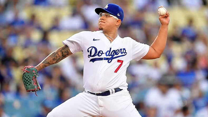 Aug 9, 2022; Los Angeles, California, USA; Los Angeles Dodgers starting pitcher Julio Urias (7) throws against the Minnesota Twins during the first inning at Dodger Stadium. Mandatory Credit: Gary A. Vasquez-USA TODAY Sports