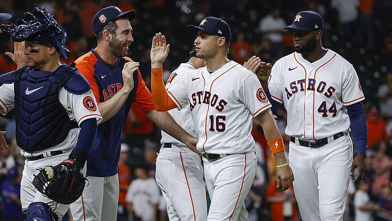 Aug 9, 2022; Houston, Texas, USA; Houston Astros left fielder Aledmys Diaz (16) celebrates with starting pitcher Justin Verlander (35) after the Astros defeated the Texas Rangers at Minute Maid Park. Mandatory Credit: Troy Taormina-USA TODAY Sports