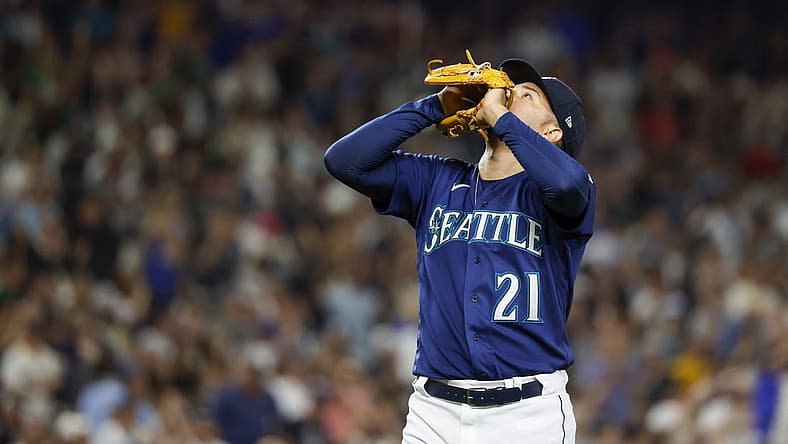 Aug 9, 2022; Seattle, Washington, USA; Seattle Mariners starting pitcher Luis Castillo (21) reacts following the final out of the top of the eighth inning against the New York Yankees at T-Mobile Park. Mandatory Credit: Joe Nicholson-USA TODAY Sports