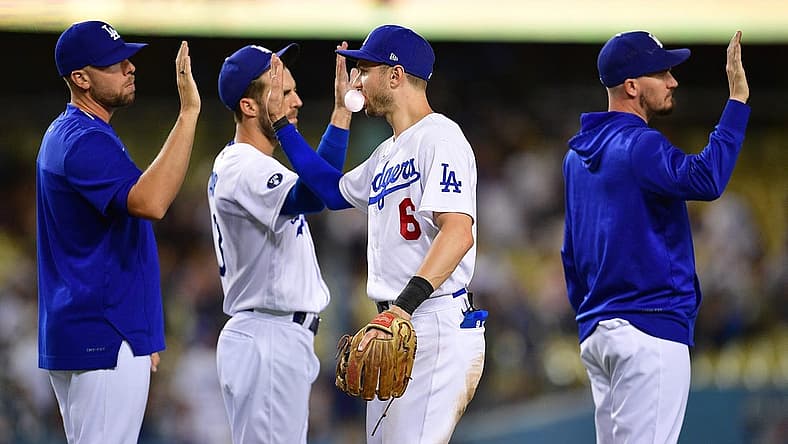 Aug 9, 2022; Los Angeles, California, USA; Los Angeles Dodgers shortstop Trea Turner (6) celebrates the victory against the Minnesota Twins at Dodger Stadium. Mandatory Credit: Gary A. Vasquez-USA TODAY Sports