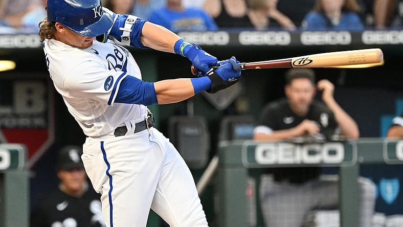Aug 10, 2022; Kansas City, Missouri, USA; Kansas City Royals third baseman Bobby Witt Jr. (7) hits an RBI single during the third inning against the Chicago White Sox at Kauffman Stadium. Mandatory Credit: Peter Aiken-USA TODAY Sports