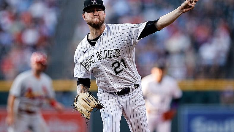 Aug 10, 2022; Denver, Colorado, USA; Colorado Rockies starting pitcher Kyle Freeland (21) pitches in the first inning against the St. Louis Cardinals at Coors Field. Mandatory Credit: Isaiah J. Downing-USA TODAY Sports