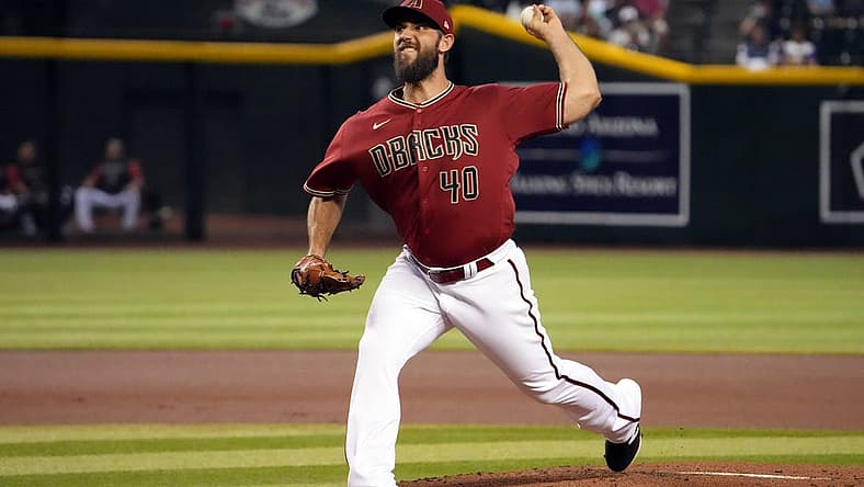 Aug 10, 2022; Phoenix, Arizona, USA; Arizona Diamondbacks starting pitcher Madison Bumgarner (40) pitches against the Pittsburgh Pirates during the first inning at Chase Field. Mandatory Credit: Joe Camporeale-USA TODAY Sports