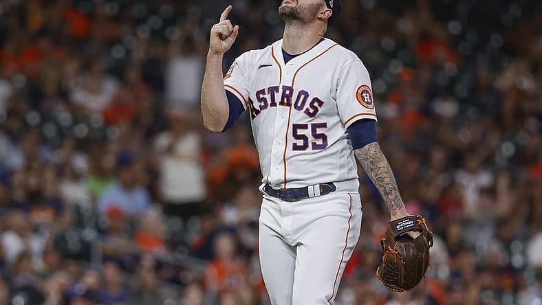 Aug 10, 2022; Houston, Texas, USA; Houston Astros relief pitcher Ryan Pressly (55) reacts after getting a strikeout during the ninth inning against the Texas Rangers at Minute Maid Park. Mandatory Credit: Troy Taormina-USA TODAY Sports