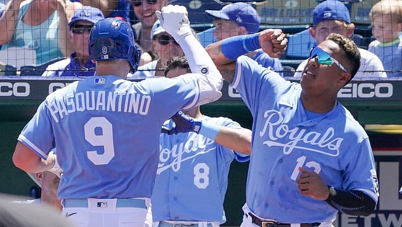 Aug 11, 2022; Kansas City, Missouri, USA; Kansas City Royals first baseman Vinnie Pasquantino (9) celebrates with designated hitter Salvador Perez (13) against the Chicago White Sox after his solo home run in the second inning at Kauffman Stadium. Mandatory Credit: Denny Medley-USA TODAY Sports