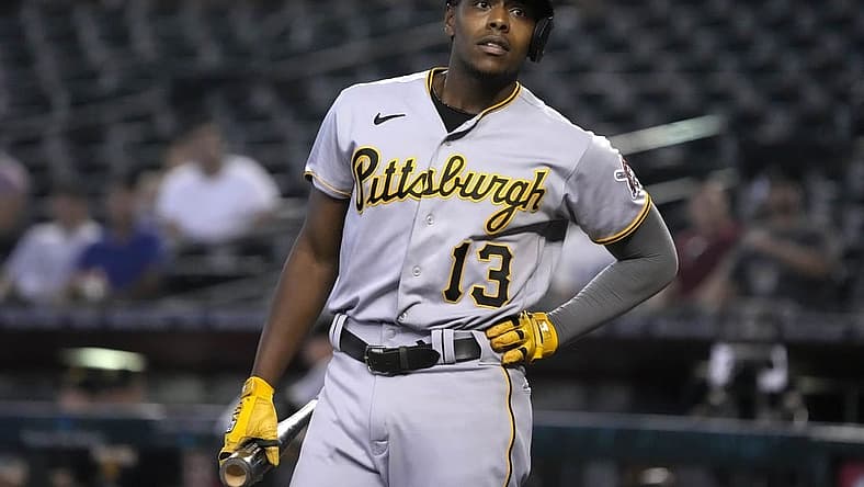 Aug 11, 2022; Phoenix, Arizona, USA; Pittsburgh Pirates third baseman Ke'Bryan Hayes (13) reacts after striking out against the Arizona Diamondbacks in the first inning at Chase Field. Mandatory Credit: Rick Scuteri-USA TODAY Sports