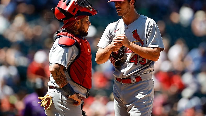 Aug 11, 2022; Denver, Colorado, USA; St. Louis Cardinals starting pitcher Dakota Hudson (43) talks with catcher Yadier Molina (4) in the second inning against the Colorado Rockies at Coors Field. Mandatory Credit: Isaiah J. Downing-USA TODAY Sports