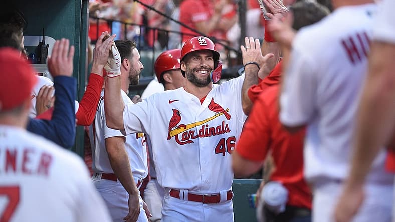 Aug 12, 2022; St. Louis, Missouri, USA; St. Louis Cardinals first baseman Paul Goldschmidt (46) is congratulated after hitting a two-run home run against the Milwaukee Brewers in the first inning at Busch Stadium. Mandatory Credit: Joe Puetz-USA TODAY Sports