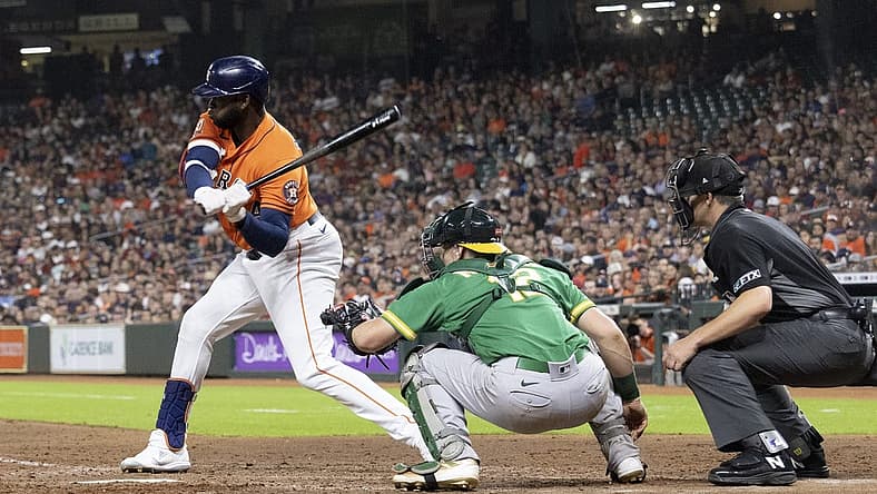 Aug 12, 2022; Houston, Texas, USA; Houston Astros designated hitter Yordan Alvarez (44) hits a single against the Oakland Athletics in the fifth inning at Minute Maid Park. Mandatory Credit: Thomas Shea-USA TODAY Sports