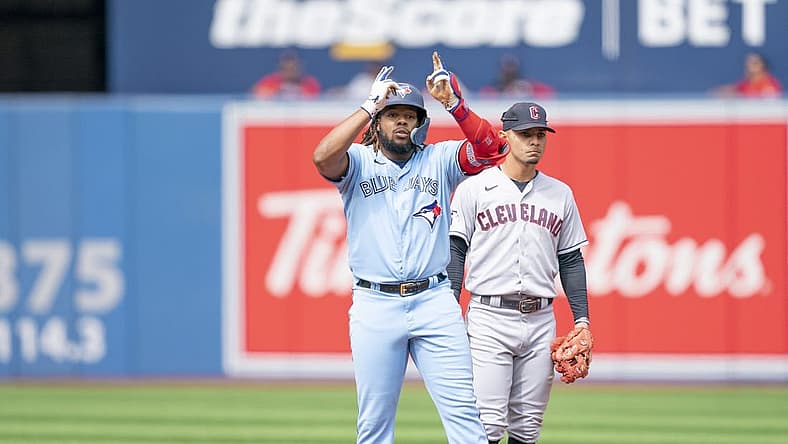 Aug 13, 2022; Toronto, Ontario, CAN; Toronto Blue Jays first baseman Vladimir Guerrero Jr. (27) celebrates hitting a double against the Cleveland Guardians during the first inning at Rogers Centre. Mandatory Credit: Nick Turchiaro-USA TODAY Sports