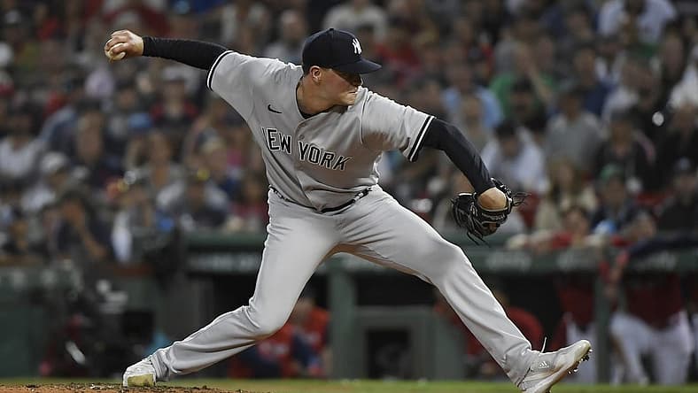 Aug 13, 2022; Boston, Massachusetts, USA; New York Yankees relief pitcher Scott Effross (59) pitches during the ninth inning against the Boston Red Sox at Fenway Park. Mandatory Credit: Bob DeChiara-USA TODAY Sports