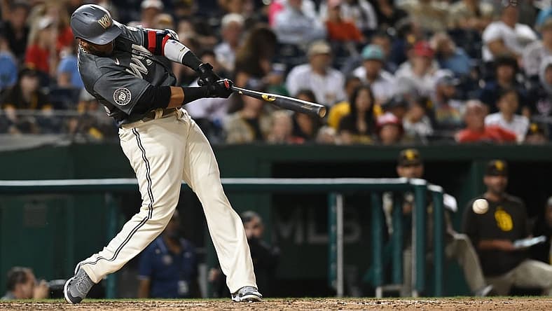 Aug 13, 2022; Washington, District of Columbia, USA;  Washington Nationals designated hitter Nelson Cruz (23) hits an eighth inning single against the Washington Nationals at Nationals Park.  Cruz reached 2000 career hits on the eighth inning at-bat. Mandatory Credit: Tommy Gilligan-USA TODAY Sports