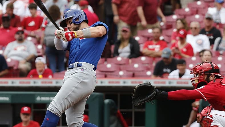 Aug 14, 2022; Cincinnati, Ohio, USA; Chicago Cubs first baseman Patrick Wisdom (16) hits a two-run home run against the Cincinnati Reds during the second inning at Great American Ball Park. Mandatory Credit: David Kohl-USA TODAY Sports