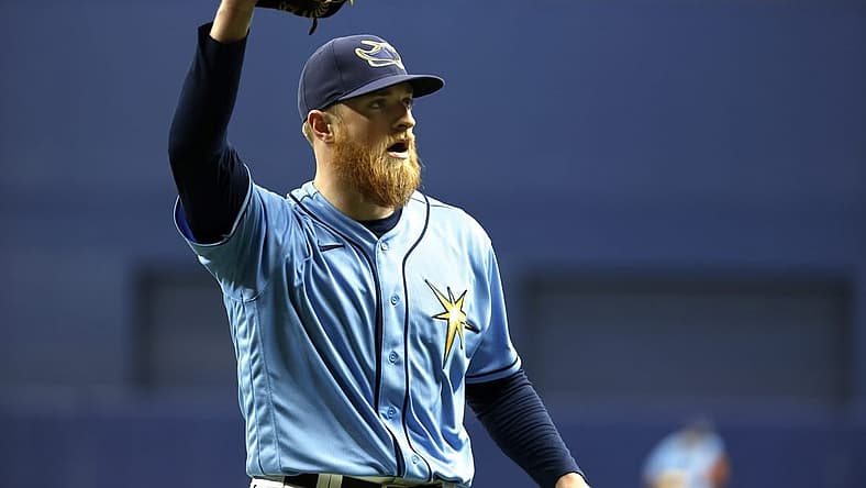 Aug 14, 2022; St. Petersburg, Florida, USA; Tampa Bay Rays starting pitcher Drew Rasmussen (57) walks back to the dugout against the Baltimore Orioles at the end of the sixth inning at Tropicana Field. Mandatory Credit: Kim Klement-USA TODAY Sports