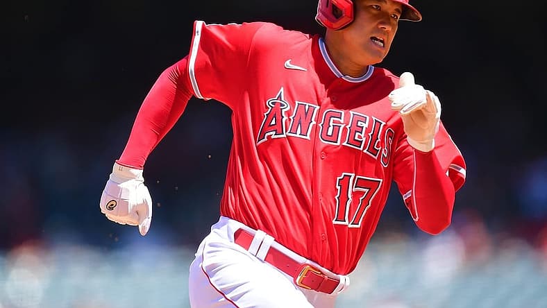 Aug 14, 2022; Anaheim, California, USA; Los Angeles Angels designated hitter Shohei Ohtani (17) runs home to score against the Minnesota Twins during the third inning at Angel Stadium. Mandatory Credit: Gary A. Vasquez-USA TODAY Sports