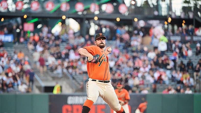 Aug 12, 2022; San Francisco, California, USA; San Francisco Giants starting pitcher Carlos Rodon (16) throws a pitch against the Pittsburgh Pirates during the first inning at Oracle Park. Mandatory Credit: Robert Edwards-USA TODAY Sports