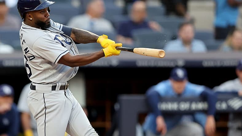 Aug 16, 2022; Bronx, New York, USA; Tampa Bay Rays right fielder Randy Arozarena (56) hits a three run home run against the New York Yankees during the first inning at Yankee Stadium. Mandatory Credit: Brad Penner-USA TODAY Sports
