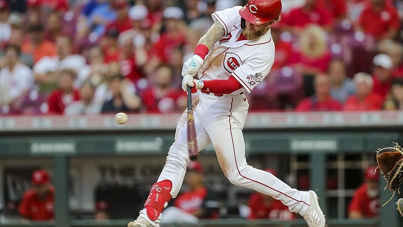 Aug 16, 2022; Cincinnati, Ohio, USA; Cincinnati Reds designated hitter Jake Fraley (27) hits a two-run home run in the third inning against against the Philadelphia Phillies at Great American Ball Park. Mandatory Credit: Katie Stratman-USA TODAY Sports