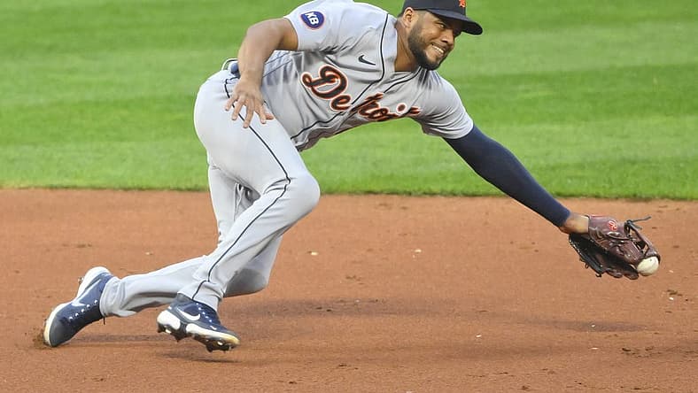Aug 16, 2022; Cleveland, Ohio, USA; Detroit Tigers third baseman Jeimer Candelario (46) reaches for the ball on a base hit in the third inning against the Cleveland Guardians at Progressive Field. Mandatory Credit: David Richard-USA TODAY Sports