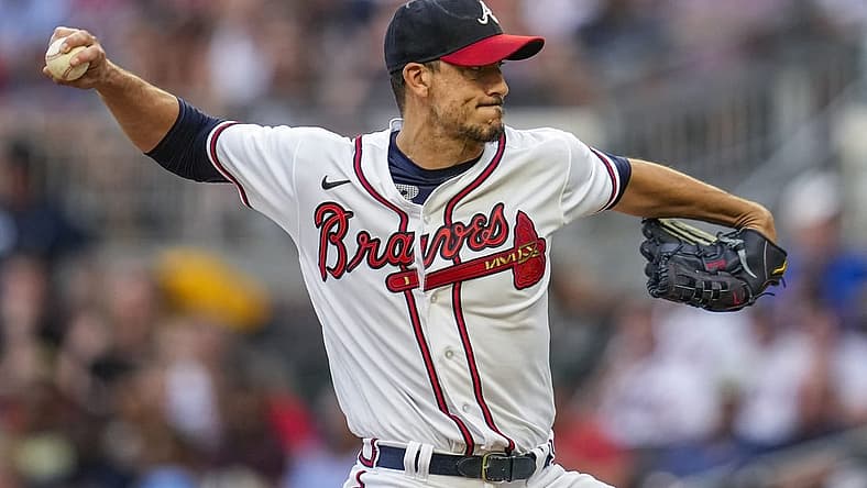 Aug 16, 2022; Cumberland, Georgia, USA; Atlanta Braves starting pitcher Charlie Morton (50) pitches against the New York Mets during the second inning at Truist Park. Mandatory Credit: Dale Zanine-USA TODAY Sports
