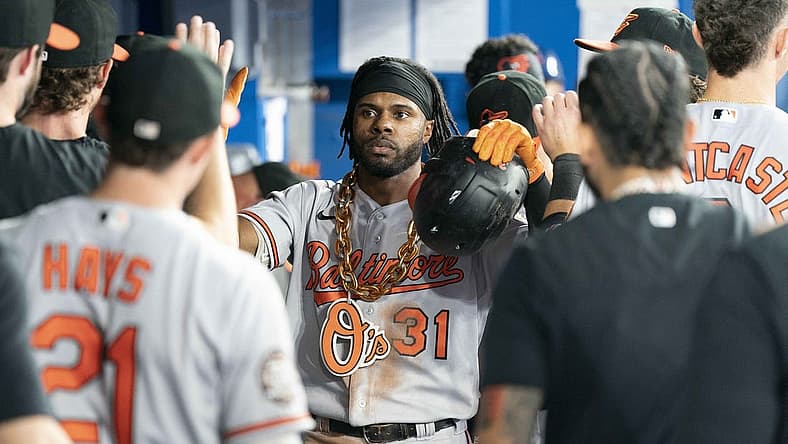 Aug 16, 2022; Toronto, Ontario, CAN; Baltimore Orioles center fielder Cedric Mullins (31) celebrates in the dugout after hitting a home run against the Toronto Blue Jays during the fifth inning at Rogers Centre. Mandatory Credit: Nick Turchiaro-USA TODAY Sports
