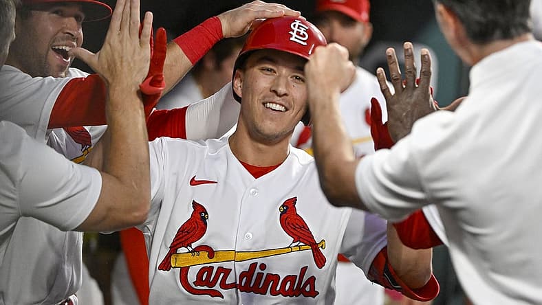 Aug 16, 2022; St. Louis, Missouri, USA; St. Louis Cardinals second baseman Tommy Edman (19) is congratulated y teammates after hitting a solo home run against the Colorado Rockies during the fourth inning at Busch Stadium. Mandatory Credit: Jeff Curry-USA TODAY Sports