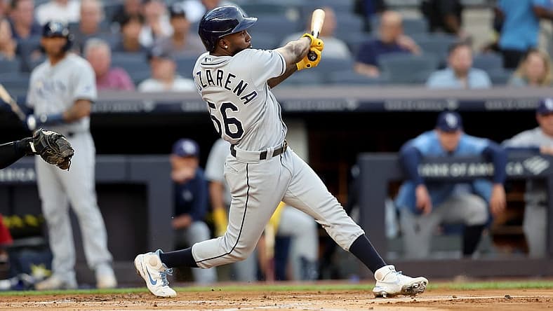 Aug 16, 2022; Bronx, New York, USA; Tampa Bay Rays right fielder Randy Arozarena (56) follows through on a three run home run against the New York Yankees during the first inning at Yankee Stadium. Mandatory Credit: Brad Penner-USA TODAY Sports