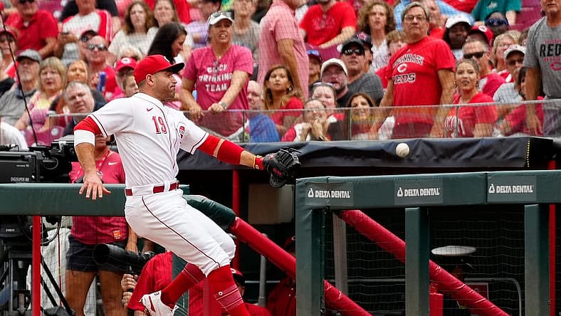Cincinnati Reds first baseman Joey Votto (19) chases a ball into foul territory in the second inning of the MLB National League game between the Cincinnati Reds and the Philadelphia Phillies at Great American Ball Park in downtown Cincinnati on Tuesday, Aug. 16, 2022.
Philadelphia Phillies At Cincinnati Reds