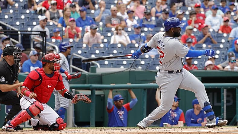 Aug 17, 2022; Washington, District of Columbia, USA; Chicago Cubs designated hitter Franmil Reyes (32) hits a double against the Washington Nationals during the second inning at Nationals Park. Mandatory Credit: Geoff Burke-USA TODAY Sports