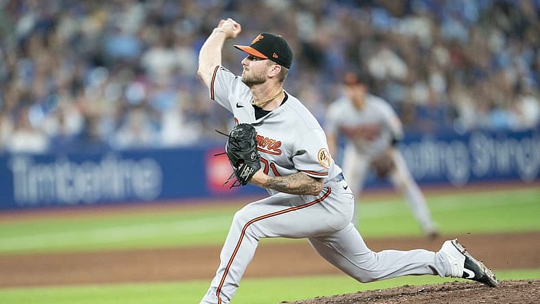 Aug 17, 2022; Toronto, Ontario, CAN; Baltimore Orioles relief pitcher Logan Gillaspie (71) throws a pitch against the Toronto Blue Jays during the eighth inning at Rogers Centre. Mandatory Credit: Nick Turchiaro-USA TODAY Sports