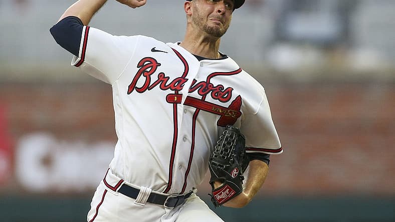 Aug 17, 2022; Atlanta, Georgia, USA; Atlanta Braves starting pitcher Jake Odorizzi (12) throws against the New York Mets in the first inning at Truist Park. Mandatory Credit: Brett Davis-USA TODAY Sports