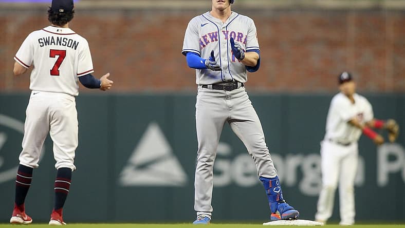 Aug 17, 2022; Atlanta, Georgia, USA; New York Mets left fielder Mark Canha (19) celebrates after a double against the Atlanta Braves in the second inning at Truist Park. Mandatory Credit: Brett Davis-USA TODAY Sports