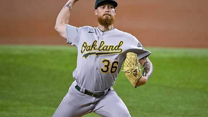 Aug 17, 2022; Arlington, Texas, USA; Oakland Athletics starting pitcher Adam Oller (36) pitches against the Texas Rangers during the first inning at Globe Life Field. Mandatory Credit: Jerome Miron-USA TODAY Sports