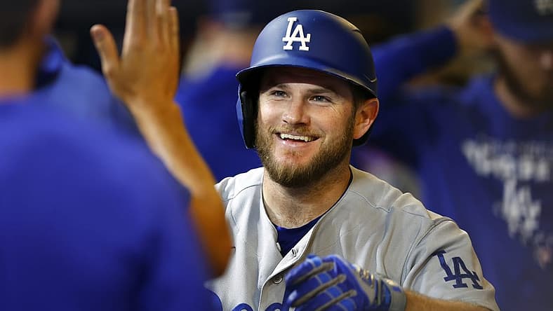 Aug 17, 2022; Milwaukee, Wisconsin, USA; Los Angeles Dodgers third baseman Max Muncy (13) celebrates after hitting a home run during the seventh inning against the Milwaukee Brewers at American Family Field. Mandatory Credit: Jeff Hanisch-USA TODAY Sports