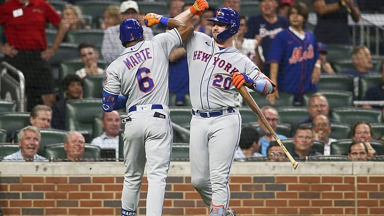 Aug 17, 2022; Atlanta, Georgia, USA; New York Mets right fielder Starling Marte (6) celebrates with first baseman Pete Alonso (20) after Marte s home run against the Atlanta Braves in the seventh inning at Truist Park. Mandatory Credit: Brett Davis-USA TODAY Sports